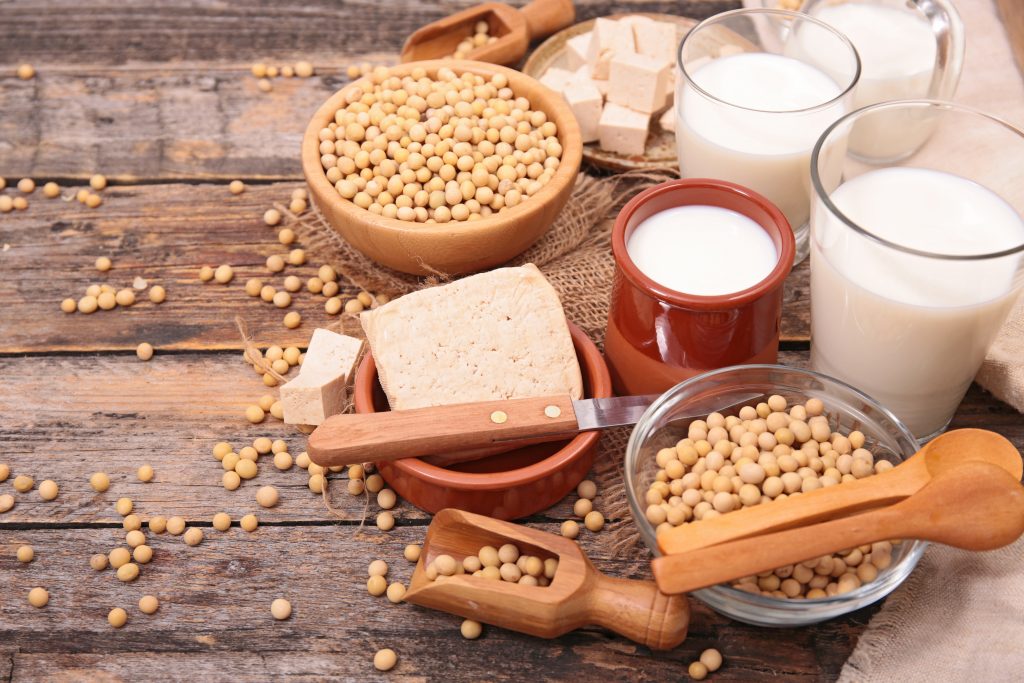 Soy myths - soy beans milk and tofu on a table